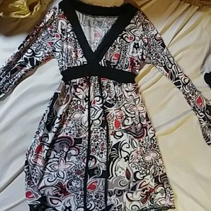 Dress with adjuatable waist size with tie